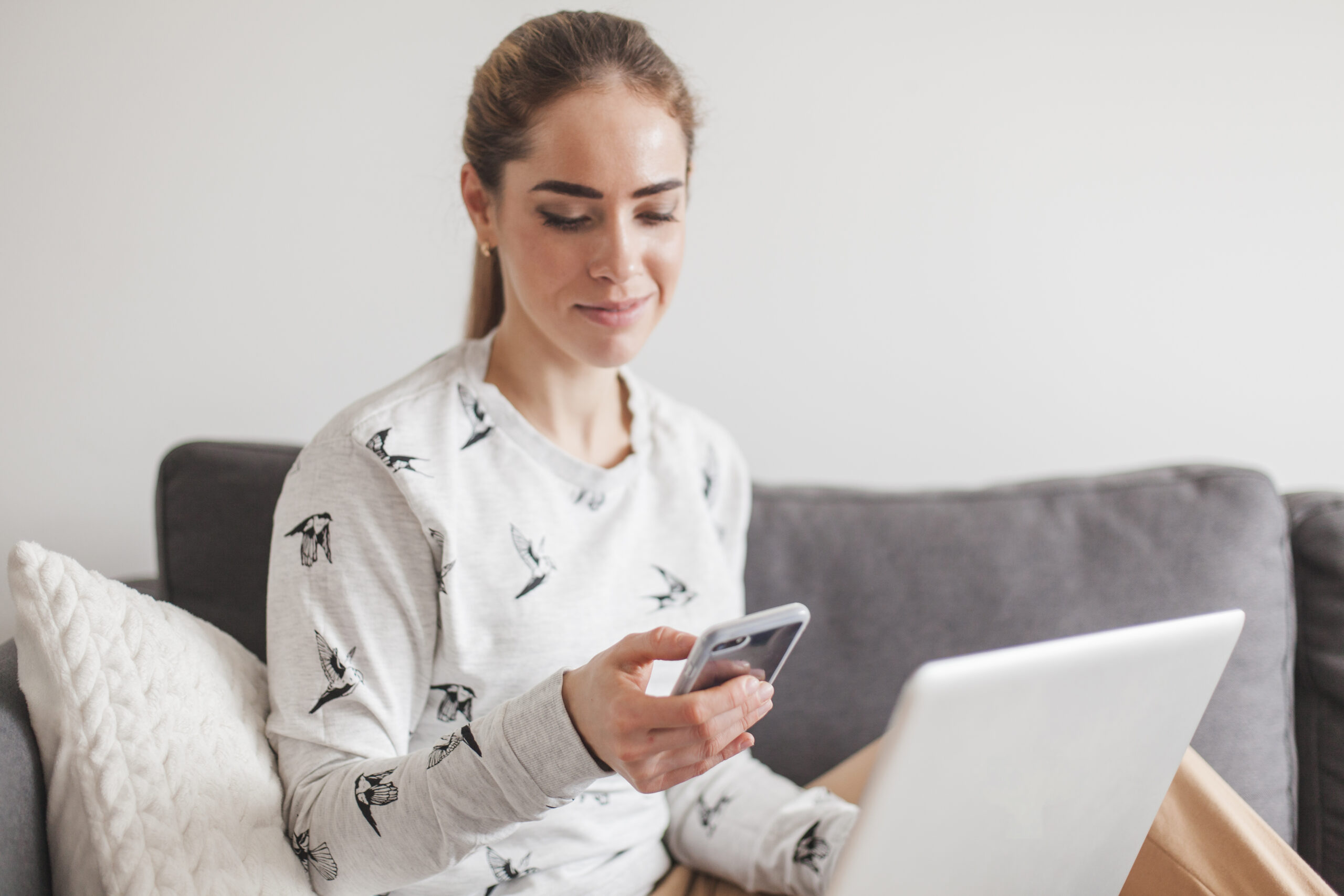 woman-with-smartphone-laptop